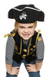 Grinning little girl wearing pirate costume