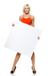 Photo: Calm woman in full length holding empty banner Calm woman in full length holding empty banner