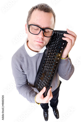Photo: Man keep computer keyboard Man keep computer keyboard