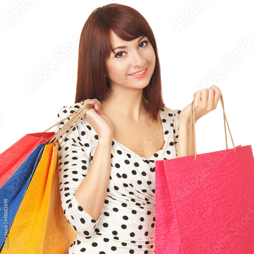 Photo: Pretty woman with shopping bags Pretty woman with shopping bags