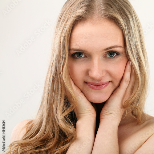 Photo: Beautiful middleaged woman with clear face Beautiful middleaged woman with clear face