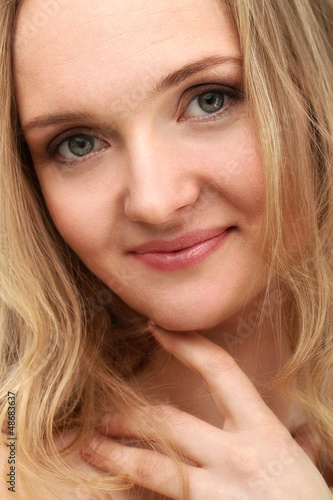 Photo: Beautiful middleaged woman with clear face Beautiful middleaged woman with clear face
