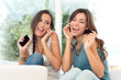 Happy Girls Listening To Music