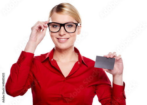 Photo: Woman showing business card Woman showing business card