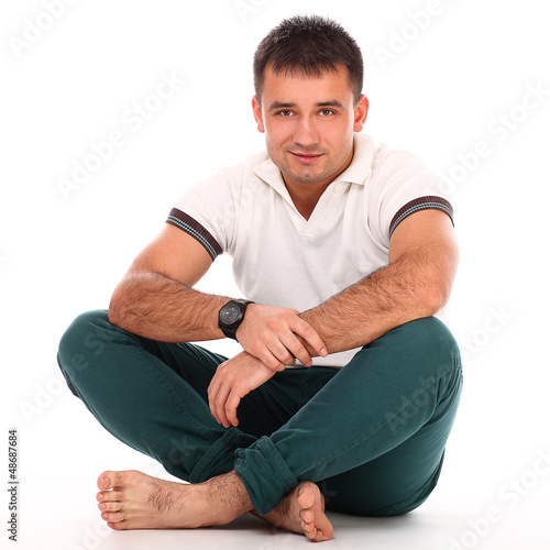 Photo: Young handsome man isolated Young handsome man isolated