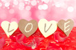Photo: Four chocolates lined up with a LOVE message written in them Four chocolates lined up with a LOVE message written in them