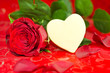 Photo: A white shaped chocolate heart with a rose A white shaped chocolate heart with a rose