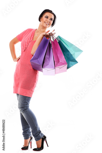 Photo: Young happy woman enjoys shopping Young happy woman enjoys shopping