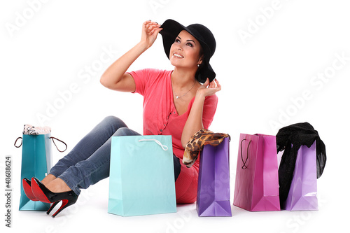 Photo: Young happy woman enjoys shopping Young happy woman enjoys shopping