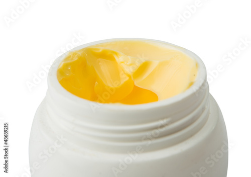 Photo: cosmetic cream in container cosmetic cream in container