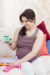  pregnant woman chooses children's things