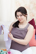  pregnant woman chooses children's things