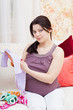  pregnant woman chooses children's things