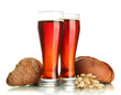 two glasses of kvass and rye breads with ears, isolated on