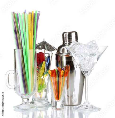 Photo: Cocktail shaker and other bartender equipment isolated on Cocktail shaker and other bartender equipment isolated on