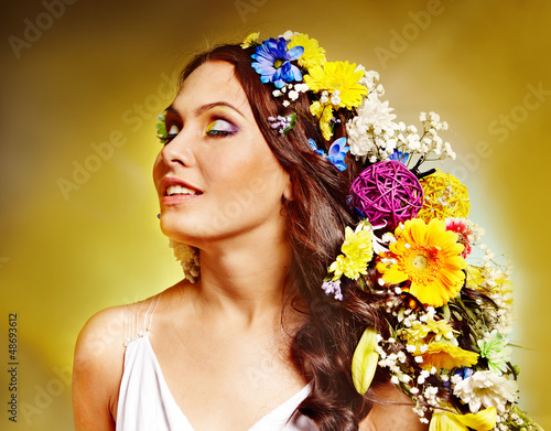 Photo: Woman with flower hairstyle. Woman with flower hairstyle.