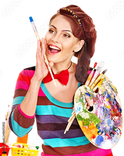 Photo: Female artist at work. Female artist at work.
