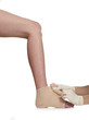 Doctor bandaging an ankle on white background.