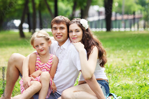 Photo: happy family having fun outdoors happy family having fun outdoors