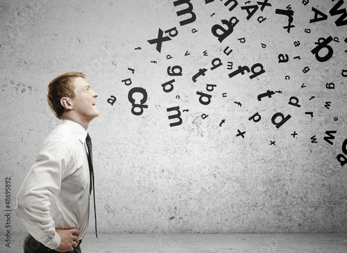 Photo: businessman with letters businessman with letters