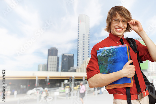 Photo: Happy student with books Happy student with books