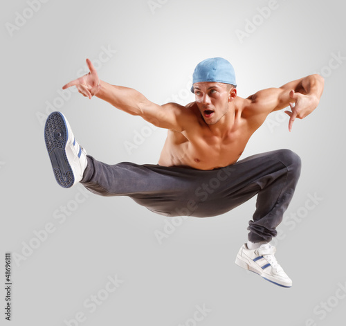 Photo: young man dancing hip hop young man dancing hip hop