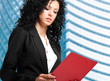 Businesswoman reading some documents