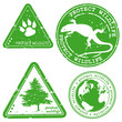 Protect wildlife written inside the stamp. Green grunge rubber s