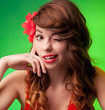 Portrait of a beautiful, playful young woman winking