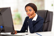 Photo: thoughtful african american businesswoman looking at computer thoughtful african american businesswoman looking at computer