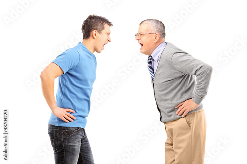 Photo: Angry father and son having an argument Angry father and son having an argument