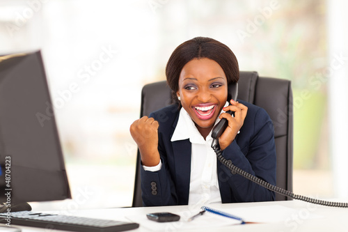 Photo: african american businesswoman receiving excited news african american businesswoman receiving excited news