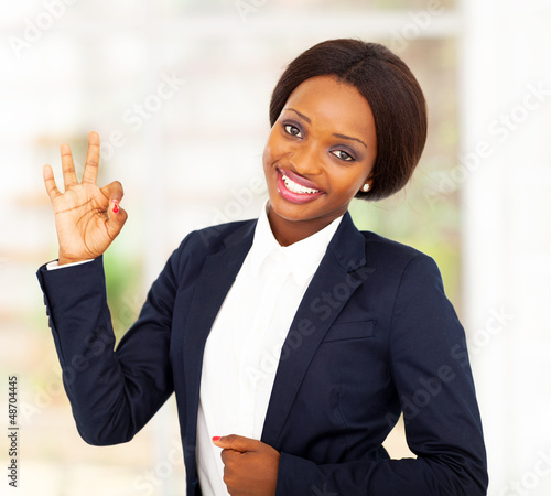 Photo: pretty african american businesswoman giving ok hand sign pretty african american businesswoman giving ok hand sign