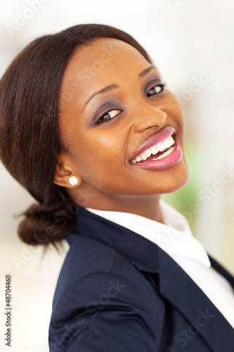 Photo: happy african american corporate worker closeup happy african american corporate worker closeup