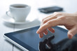 finger touching screen on tablet-pc