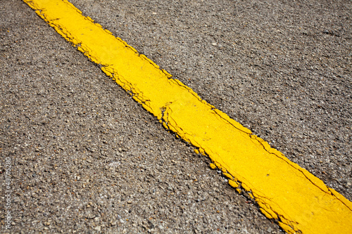 Photo: texture of yellow street line texture of yellow street line