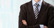 Closeup of torso of confident business man wearing elegant suit