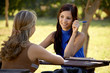 Young college students talking and studying for university exam