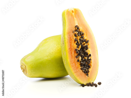 Photo: Whole and half Papaya fruit isolated Whole and half Papaya fruit isolated