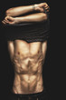 Revealing his finely toned body