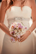 Wedding bouquet in bride hands