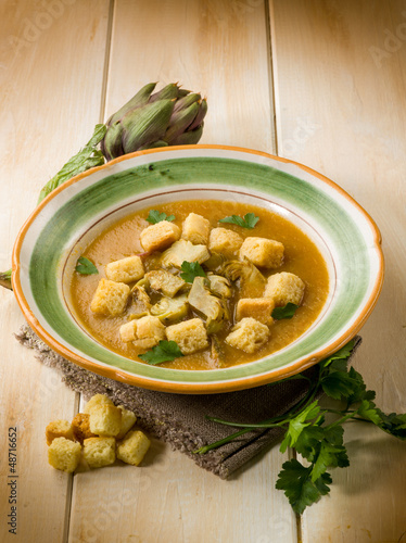 Photo: artichoke soup with toasted sliced bread, vegetarian food artichoke soup with toasted sliced bread, vegetarian food
