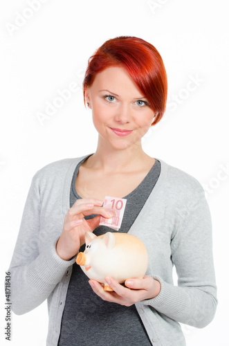 Photo: mädchen spart geld mädchen spart geld