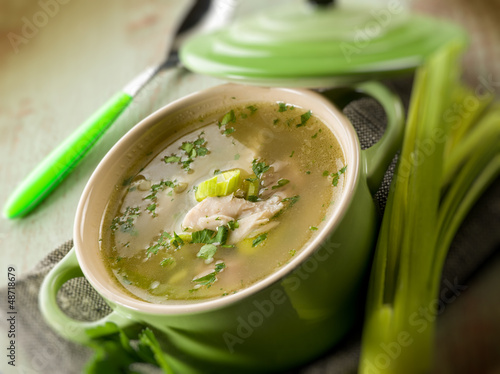 Photo: soup with chicken and leek, selective focus soup with chicken and leek, selective focus