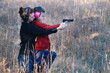 Photo: Mom and Daughter Practicing Shooting Mom and Daughter Practicing Shooting