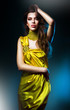 sensual sexy woman in green dress and blue light