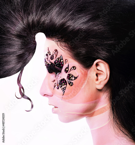 Photo: pink flower woman with creative hair and face art with rhineston pink flower woman with creative hair and face art with rhineston