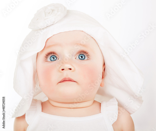 Photo: scared little child in white hat scared little child in white hat