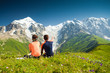 Photo: Hiker take a rest during hiking in Caucasus mountains, Georgia Hiker take a rest during hiking in Caucasus mountains, Georgia