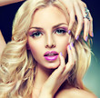 Beautiful blonde girl with lilac makeup